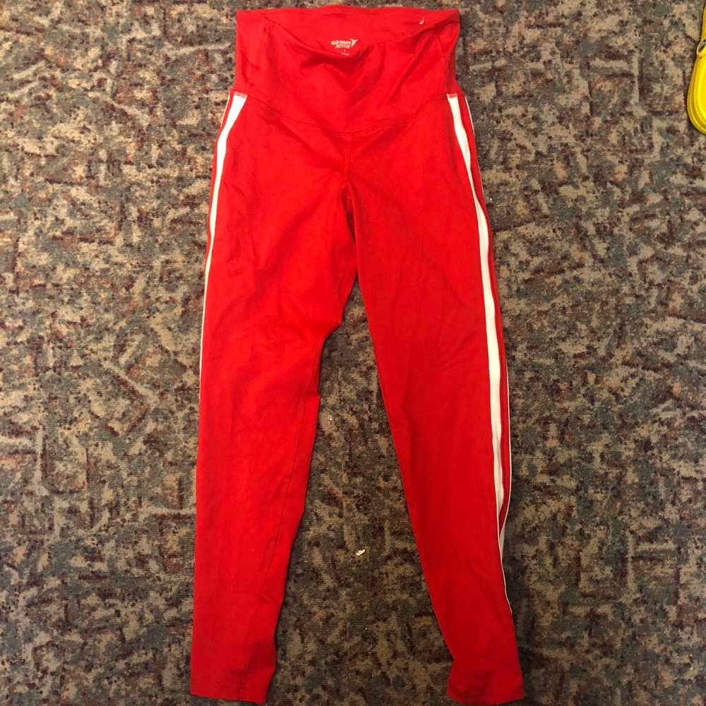 Red athletic leggings with pin stripes
